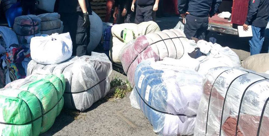 Aseguran 5 toneladas de ropa de paca y 5 sujetos en CDMX